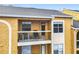 Exterior view of a condo balcony with furniture at 5255 Images Cir # 305, Kissimmee, FL 34746