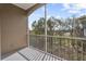 Enjoy outdoor living on this screened balcony with scenic views of lush landscaping at 584 Brantley Terrace Way # 209, Altamonte Springs, FL 32714