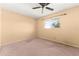 Empty bedroom with a ceiling fan and minimal natural light at 8430 Pamlico St, Orlando, FL 32817