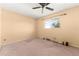 Empty bedroom with a ceiling fan and minimal natural light at 8430 Pamlico St, Orlando, FL 32817