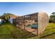 Screened pool with seating, connected to an expansive outdoor entertaining area at 8430 Pamlico St, Orlando, FL 32817