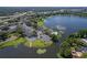 Aerial view showing the community, the lake, a pool and plenty of parking at 942 Lake Destiny Rd # B, Altamonte Springs, FL 32714