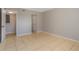 Light-filled bedroom with tile floors, a closet, and neutral walls offer a blank slate at 942 Lake Destiny Rd # B, Altamonte Springs, FL 32714