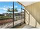 View from the screened-in patio showcasing the community pool and well-maintained landscaping at 942 Lake Destiny Rd # B, Altamonte Springs, FL 32714