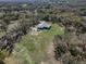 Home with a lush yard, mature trees, and a refreshing pool at 10688 Sw 129Th Terrace Rd, Dunnellon, FL 34432