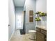 Bright bathroom featuring a modern vanity, stylish fixtures, and a walk-in shower at 10688 Sw 129Th Terrace Rd, Dunnellon, FL 34432