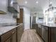 Bright kitchen showcasing stainless steel appliances, granite countertops, and ample storage space at 10688 Sw 129Th Terrace Rd, Dunnellon, FL 34432