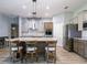 Contemporary kitchen with stainless appliances, a center island, and a seamless design for entertaining at 10688 Sw 129Th Terrace Rd, Dunnellon, FL 34432