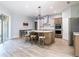 Well-equipped kitchen with a spacious center island, modern appliances, and ample countertop space at 10688 Sw 129Th Terrace Rd, Dunnellon, FL 34432