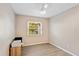 Bedroom featuring neutral paint, ceiling fan, and laminate floors at 113 Wheatland Ct, Longwood, FL 32779