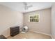 Bedroom featuring neutral paint, tile floors, and a modern ceiling fan at 113 Wheatland Ct, Longwood, FL 32779