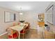 Inviting dining room with a wooden table, decorative chairs, and easy access to the kitchen at 113 Wheatland Ct, Longwood, FL 32779