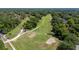 Scenic golf course view featuring manicured greens, sand traps and lush landscaping at 116 Cambridge Dr, Longwood, FL 32779