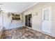 Enclosed patio features a brick floor and access to backyard at 116 Cambridge Dr, Longwood, FL 32779