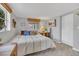 Inviting bedroom featuring two windows and neutral color palette at 119 Mayfair Cir, Sanford, FL 32771