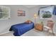 Comfortable bedroom showcasing natural light and simple decor at 119 Mayfair Cir, Sanford, FL 32771