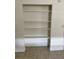 Built in shelving next to tile flooring provides display and organizational options at 1352 Sw 69Th Rd, Bushnell, FL 33513