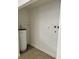 Utility room featuring a water heater and connections for appliances at 1352 Sw 69Th Rd, Bushnell, FL 33513