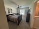 Cozy bedroom with natural light and a ceiling fan at 15198 Harrington Cove Dr, Orlando, FL 32824