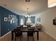 Comfortable living room and dining area with lots of natural light and modern decor at 15198 Harrington Cove Dr, Orlando, FL 32824