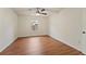 Clean bedroom with wood floors, providing a cozy and inviting atmosphere at 1600 Amboy Dr, Deltona, FL 32738