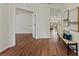Foyer featuring hard wood flooring, natural lighting, and an open floor plan at 1600 Amboy Dr, Deltona, FL 32738
