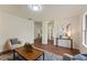 Bright living room with wood floors, neutral paint, and ample natural light at 1600 Amboy Dr, Deltona, FL 32738