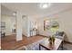 Inviting living area with a large window and seamless flow into other living spaces at 1600 Amboy Dr, Deltona, FL 32738