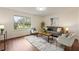 Inviting living room featuring plenty of natural light, and contemporary decor at 1600 Amboy Dr, Deltona, FL 32738