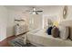 The main bedroom features a ceiling fan, ensuite bath, and lots of natural light at 1600 Amboy Dr, Deltona, FL 32738