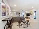 Spacious basement area featuring cartoon themed decor and a full size seating area and game area at 1602 Lima Ave, Kissimmee, FL 34747