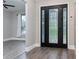 Beautiful foyer featuring an ornate front door and wood-look floors at 1621 Crescent Rd, Longwood, FL 32750