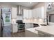 Contemporary kitchen with quartz countertops, stainless steel appliances, and ample storage at 1621 Crescent Rd, Longwood, FL 32750