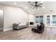 Living room showcasing vaulted ceilings, a fireplace, and serene views of the outdoors at 1621 Crescent Rd, Longwood, FL 32750