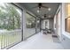 Expansive covered patio with multiple ceiling fans, offering ample outdoor living space at 1621 Crescent Rd, Longwood, FL 32750