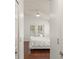 Bedroom with wood flooring leading to the pool through sliding glass doors at 16224 Magnolia Hill St, Clermont, FL 34714