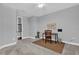 Bedroom featuring neutral walls, a ceiling fan, a desk area for work or study, and stairway access at 16828 Sanctuary Dr, Winter Garden, FL 34787