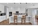 Kitchen with island, stainless steel appliances and lots of cabinet space at 16828 Sanctuary Dr, Winter Garden, FL 34787