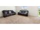 Inviting living room showcasing plush sofas, perfect for relaxation and entertaining at 2024 Griffin Oaks Way, Tavares, FL 32778