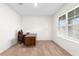Cozy home office features natural light, neutral carpet, and a wooden desk at 2024 Griffin Oaks Way, Tavares, FL 32778
