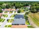 Neighborhood aerial view showcasing well-maintained homes, mature trees and landscaping in a quiet community at 239 Bronze Leaf Ct, Apopka, FL 32703