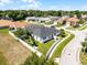 Aerial view of the home highlighting the backyard play area and manicured lawn at 239 Bronze Leaf Ct, Apopka, FL 32703