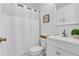 Clean bathroom with shower, vanity, mirror, toilet, and a humorous sign at 239 Bronze Leaf Ct, Apopka, FL 32703
