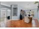 Inviting dining room features hardwood floors and a built-in wine rack, perfect for entertaining guests at 239 Bronze Leaf Ct, Apopka, FL 32703