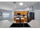 Bright kitchen featuring stainless steel appliances, tile floors, and abundant countertop space at 239 Bronze Leaf Ct, Apopka, FL 32703