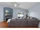 Comfortable living room featuring a sectional sofa, TV, and sliding glass doors to patio at 239 Bronze Leaf Ct, Apopka, FL 32703