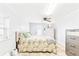 Well-lit bedroom offering neutral colors, tile floors, and direct access to the outdoors at 2413 Weber St, Orlando, FL 32803