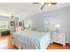 Comfortable main bedroom featuring wood floors, great natural light, and contemporary decor at 2413 Weber St, Orlando, FL 32803