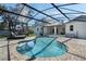 Enclosed backyard pool with sun loungers and brick-paved patio area at 243 Shady Oaks Cir, Lake Mary, FL 32746