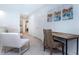 Bright hallway with a small desk area, featuring neutral decor and modern accents at 2486 Dubai St, Kissimmee, FL 34747